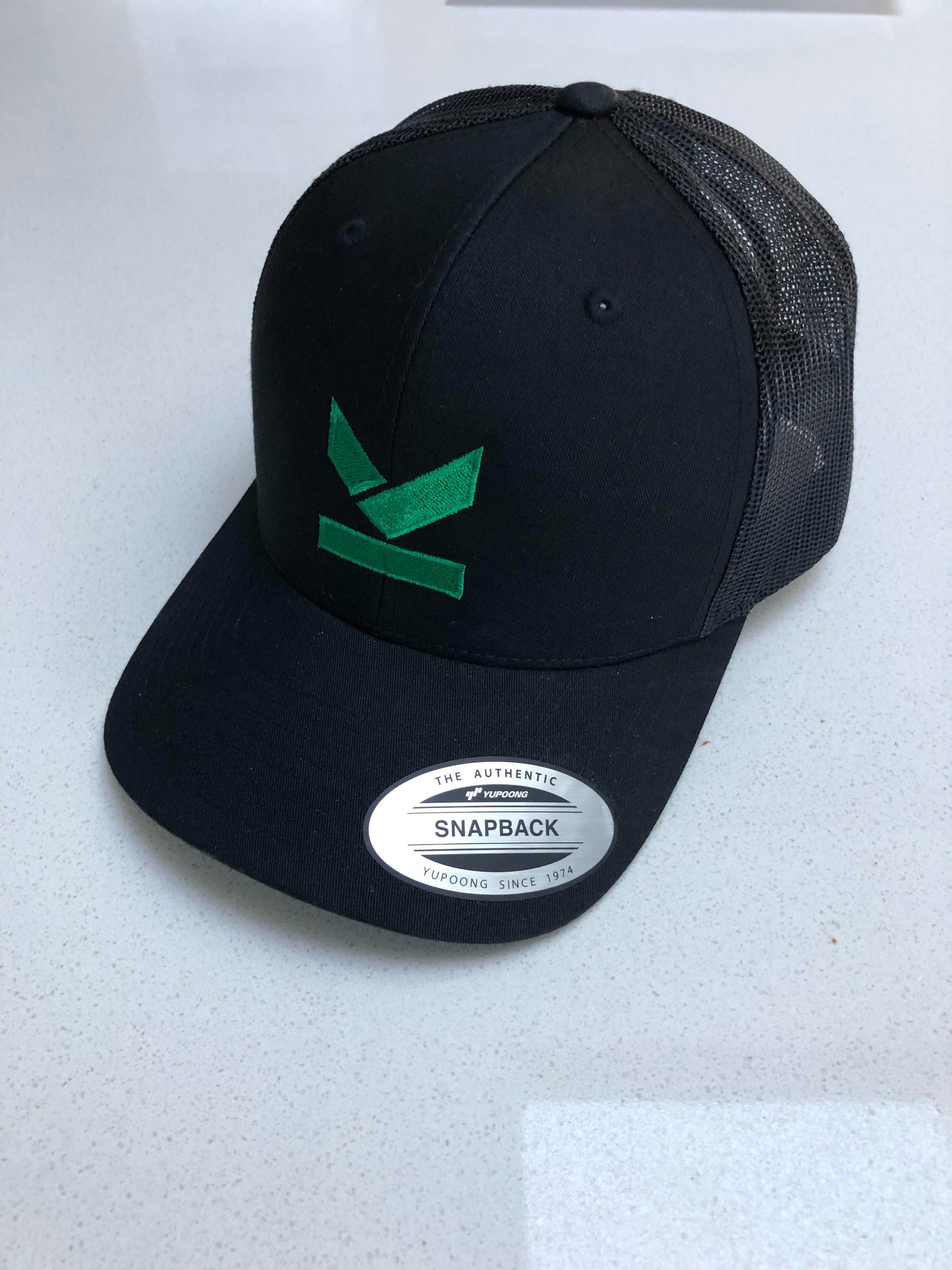 Limited edition green logo snapback hat with curved peak in 3 differen –  Kodish clothing